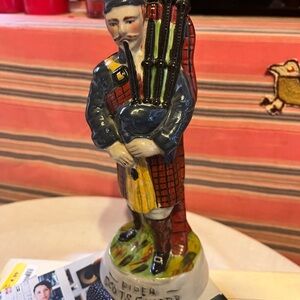 Red and Yellow Ceramic Art Figurinestaffordshire-like figurine of a Scottish bag